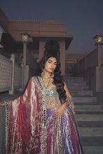 Load image into Gallery viewer, Alaviaa Jaaferi on palace steps at dusk in a pink lehenga and sheer dupatta with the jumbo jhumkas