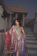 Load image into Gallery viewer, Alaviaa Jaaferi holding her dupatta open on stone steps, wearing the Jumbo Jhumka Earrings