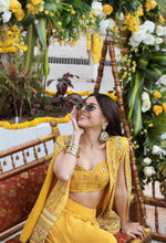 Load image into Gallery viewer, Alaya F in yellow among flowers and a decorated swing, wearing Ritika Sachdeva statement earrings